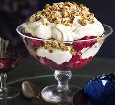 a dessert in a glass bowl on a table