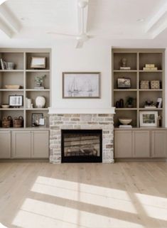 a living room filled with furniture and a fire place