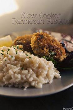 a plate with rice, meat and vegetables on it that says slow cooker parmesan risotto