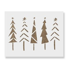 christmas trees are drawn on a piece of paper