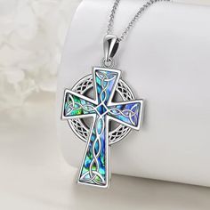 Elegant Celtic Cross Necklace: Elevate your style with the timeless elegance of our Celtic Knot Cross Necklace. The Celtic knot, also known as the trinity knot, is a symbol of good luck and best wishes for its owner. This dainty and exquisite necklace is a perfect gift that holds deep meaning and captures everyone's attention with its captivating design. Perfect Necklace Size: The pendant of this necklace boasts dimensions of 0.55 x 1.02 inches (14mm x 26mm), striking a balance between daintiness and visual impact. The chain measures 18 inches with an additional 2 inches extension, allowing you to customize the length to suit your preferences. The necklace weighs 4.1 grams, ensuring both comfort and style. Sterling Silver Brilliance: Crafted from premium quality, hypoallergenic platinum-pl Mother's Day Sterling Silver Cross Necklace, Silver Cross Pendant Necklace For Mother's Day, Silver Cross Necklace For Mother's Day, Silver Cross Jewelry For Mother's Day, Celtic Knot Cross, Celtic Cross Necklace, Trinity Knot, Love Pendant, Infinity Heart