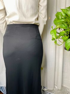 "This is a black poly/acetate blend maxi skirt made by the brand Express in the 1990s. It has cute high slits on both sides and is very stretchy everywhere besides the waist band. Tag size XS but seems to have stretched out a bit over time so it would more comfortably fit a women's medium. All measurements are taken flat then doubled for total circumference. Waist:28\" Hips: 34\" Length: 35\"" Cargo Pants Baggy, Goth Outfit Ideas, The 1990s, Goth Outfits, Black Maxi, Golden Girls, Waist Band, Skirt Fashion, Cincinnati