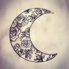 a drawing of a crescent with roses on it