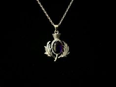 "Large Handcast 925 Sterling Silver Scottish Thistle Pendant accented with faceted Amethyst + Free 18\" long 316L non allergenic Surgical/Stainless Steel Cable Link Chain (Picture#1) OR 18\" long 925 Sterling Silver Box Chain (Picture#2) Longer chains available for a surcharge. Chain Choices: 316L Surgical/Stainless Steel Cable Link Chain (Picture#1) 925 Sterling Silver Box Chain (Picture#2) 925 Sterling Silver Rope Chain (Picture#3) 925 Sterling Silver Snake Chain (Picture#4) The Scottish Thist Classic Purple Necklace For Gift, Classic Silver Amethyst Necklace, Engraved Sterling Silver Purple Necklace, Engraved Purple Sterling Silver Necklace, Purple Engraved Sterling Silver Necklace, Amethyst Pendant Necklace, Silver Rope Chain, Amethyst Necklace Pendant, Celtic Knotwork