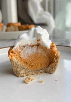 a piece of pie sitting on top of a white plate