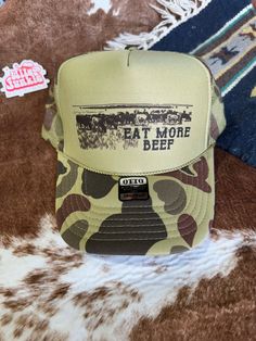 For the love of beef! This playful hat features a fun and whimsical slogan that is sure to get people talking. Crafted for comfort and style, this foam cap features a 100% polyester front and a breathable mesh back. With an adjustable snap closure, it ensures the perfect fit for all head sizes. One Size Fits Most Summer Trucker Hat For Camping, Fun Trucker Hat With Letter Print For Outdoor, Fun Letter Print Trucker Hat For Outdoor, Fun Outdoor Snapback Hat With Flat Bill, Fun Snapback Trucker Hat For Outdoor, Outdoor Trucker Hat With Letter Print, Camping Trucker Hat One Size, Fun 5-panel Trucker Hat For Outdoor, Fun Trucker Hat For Outdoor Use