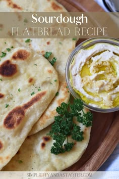 some flatbreads are sitting on a plate with dip