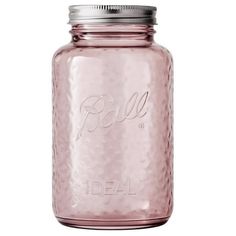 a pink mason jar with the word ideal written in silver on it and a metal lid