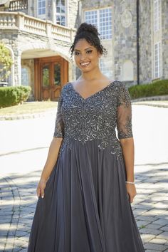 Beautiful A-Line Lace Elbow length Mother of the occasion dress. Lace appliques scatter the bodice of MGNY 71805. The keyhole back adds a stand out touch. The flowing skirt adds a touch of whimsy. Also, perfect for gala or an evening dress. Bride And Groom Silhouette, Madeline Gardner, New York Dress, Princess Sleeves, Bridal Bridesmaid Dresses, Special Occasion Dress, Allure Bridal, York Dress, Mothers Dresses