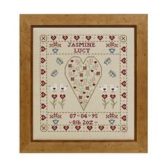 a cross stitch pattern with hearts and flowers