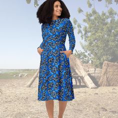 Ethnic Summer Clothing African Blue Green Dress, Afrocentric Fashion, Vibrant Tribal Print Meet your new favorite dress! Original African print designed by me. Its soft fabric and flattering cut will ensure you feel comfortable and feminine all day long. Plus, the fitted waist and flared bottom part of the dress will accentuate the wearer's naturally beautiful silhouette. The best part about the dress? It. Has. Pockets.   * Fabric composition in the EU: 96% polyester, 4% spandex  * Fabric composition in the US: 93% polyester, 7% spandex  * Fabric weight: 6.19 oz/yd2 (210 g/m2) (weight may vary by 5%)  * Premium knit mid-weight jersey fabric  * Midi length  * Long sleeves  * Side pockets  * Boat neckline  * Fitted on the waist  * Flared bottom part  * Blank product components in the EU sour Blue Long Sleeve Ankara Dress, Blue Green Dress, Afrocentric Fashion, Beautiful Silhouette, Vibrant Style, Summer Clothing, Boat Neckline, Favorite Dress, Dress Clothes For Women