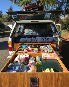 the back end of a van filled with items