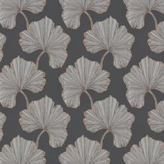 a gray and white wallpaper with large leaves on it's back drop down