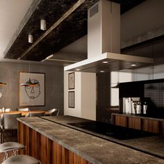 a modern kitchen with an island counter and stools