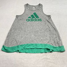 Adidas Girls Active Top sz L Gray Green Sleeveless Tunic Lightweight Stretch Please see photos for best description & measurements. Feel free to ask any questions. Item comes from a smoke free and pet free environment. Please check out our selection of children's, men's and women's items in our eBay store! Thanks for looking and Happy eBaying! Active Top, Adidas Girl, Sleeveless Tunic, Gray Green, Athletic Tank Tops, Ebay Store, Green And Grey, The Selection, Adidas