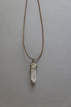 "Raw crystal necklace of natural white quartz, wrapped in wire. Size of pendant: each crystal is about 35-40mm, raw shape, non polished. Length of necklace: Adjustable cord necklace, can be chosen from 16\"to 26\", or 20\" to 30\". ------------------------------------------------ Wire options: ▲ 18 k gold plated wire ▲ Silver plated wire ▲ Antique brass plated wire ▲ Black wire ▲ Copper wire ------------------------------------------------ The price is for one necklace. Please kindly understand Minimalist Adjustable Wire Wrapped Crystal Necklaces, Minimalist Wire Wrapped Crystal Necklaces For Healing, Spiritual Wire Wrapped Quartz Crystal Necklace, Spiritual Quartz Crystal Necklace Wire Wrapped, Spiritual Quartz Wire Wrapped Crystal Necklace, White Quartz Pendant Crystal Necklaces, Handmade White Quartz Crystal Necklace, Minimalist White Wire Wrapped Necklace, Minimalist White Quartz Crystal Necklace