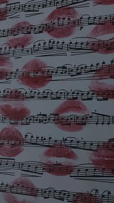 sheet music with red lipstick on it