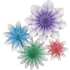 three different colored paper flowers on a white background