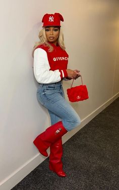 Hoodies And Boots Outfit, Shark Boots Outfit Black Women Winter, Red Shark Boots Outfit Black Women, Toya Wright Outfits, Tomboy Glam Outfits, Shark Boots Outfit Ideas, Outfits With Fitted Hats Black Women, Red Cap Outfits For Women, Tan And Red Outfits