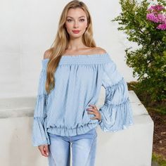 The Anna-Kaci Women's Off-Shoulder Bell Sleeve Top with Textured Dobby Pattern and Smocked Neckline is a feminine and elegant piece that adds a touch of boho-chic to your wardrobe. Crafted from lightweight, breathable fabric, this top features a textured dobby pattern that adds subtle sophistication. The smocked neckline allows for a comfortable off-shoulder fit, while the dramatic bell sleeves add a flowy and romantic vibe. Perfect for date nights, casual outings, or special occasions, this top Dobby Pattern, Mom On The Go, Bell Sleeve Shirt, Tie Waist Top, Oversized Flannel, Date Nights, Ruffled Sleeve Top, Comfortable Tops, Mesh Long Sleeve