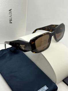 Brand new Prada PR17WS Sunglasses in Brown.Featuring a brown havana acetate frame with dark brown lenses.Gold metal Prada logos on temples.Size 49-20-145.100% authentic and unworn.Made in Italy.Box, case, cloth and paperwork included. Sold out everywhere. Designer Brown Sunglasses With Mirrored Lenses, Designer Brown Sunglasses With Uv Protection, Designer Brown Sunglasses With Polarized Lenses, Luxury Brown Sunglasses With Uva Protection, Designer Brown Tinted Sunglasses, Designer Brown Sunglasses With Uva Protection, Prada 17ws, Prada Pr17ws, Prada Pr 17ws