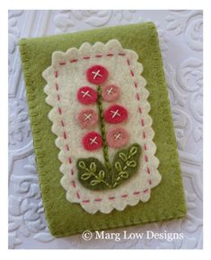 a close up of a small card with flowers on it