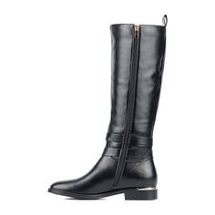 Introducing the newest addition to our line of classy boots, the Belladona. This tall boot features a harness with an o-ring , pointy toe and a thick comfortable outsole. The perfect addition to this season's wardrobe.Shaft Circumference: 16 InchesBoot Shaft Height: 18 InchesShoe Heel Height: 1 InchUpper/Outer Base Material: 100% SyntheticShoe Lining Material: PolyurethaneSole Material Content: 100% RubberCalf Width: RegularToe Type: Pointed Toe, Closed ToeHeel Style: Flat HeelCountry of Origin… Elegant High Ankle Boots With Buckle Closure, Elegant Moto Boots With Buckle Closure For Winter, Elegant Winter Moto Boots With Buckle Closure, Elegant High Ankle Moto Boots, Elegant Knee-high Moto Boots For Workwear, Elegant Knee-high Moto Boots For Work, Elegant Black Knee-high Moto Boots, Black Boots Flat, Classy Boots