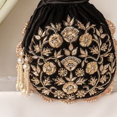 Black Velvet Potli Bag, Zardozi Katdana Sequin Embroidery Evening Bag for Wedding, Handmade Drawstring Purse, Bridesmaid Gifting Small Purse Size  : 10 x 8 Inches Pacakge Content : 1 Pcs Designed with the heart, this beautiful Potli or batawa bag are eye catchy and made of premium material. Key Features: Embroidery art work This potli is good match with both Indian and western outfits and are superb for wedding and festive parties This would be best complement to your designer saree, lenhga or any other kind of dress This is the combination of traditional and modern embroidery work This is enough to keep your accessories and all needed essentials and it can be a best gift for any woman. Embroidered Potli Bag For Diwali Evening, Bollywood Style Embroidered Evening Potli Bag, Traditional Embroidered Fabric For Evening, Traditional Intricate Embroidered Fabric For Evening, Black Embroidered Fabric With Dori Work For Wedding, Traditional Embroidered Fabric With Zari Work For Evening, Traditional Zari Work Embroidered Fabric For Evening, Traditional Evening Embroidered Fabric With Floral Design, Traditional Floral Embroidered Fabric For Evening