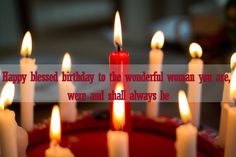 a birthday cake with lit candles on it and the words happy blaseed birthday to the wonderful woman you are, were and final always be