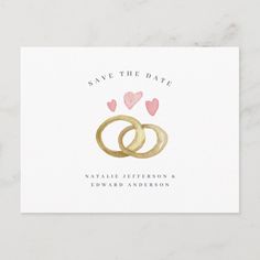 save the date card with two gold rings and hearts on it, against a white background