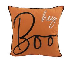 an orange and black pillow with the word boo on it's front, which reads hey boo