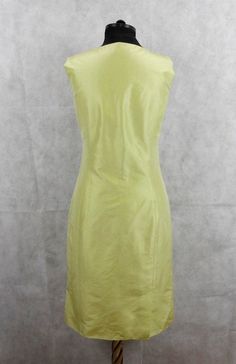 Elegant dress by Etro, sleeveless plain model with small slits in the front and rear, zip to the left,in pale green color, full lining. Made of 76% cotton, 24% silk, lining - 100% silk, made in Italy, size 42 Very well preserved Measurements taken flat: Length 99 cm / 39'' Shoulder width 35 cm / 13.7'' Waist 39 cm / 15.4'' Hips 47 cm / 18.5'' Fitted Sleeveless Light Green Dress, Elegant Sleeveless Light Green Dress, Light Green Fitted Sleeveless Dress, Fitted Light Green Sleeveless Dress, Sleeveless Dress With Back Zipper, Green Sleeveless Dress For Formal Summer Occasions, Green Sleeveless Dress For Formal Summer Events, Summer Green Sleeveless Dress For Formal Events, Formal Green Sleeveless Dress For Summer