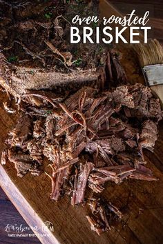 a wooden cutting board topped with chopped meat