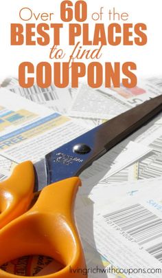 a pair of scissors sitting on top of a pile of coupons