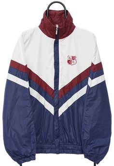 Navy, maroon and white colourblock jacket with BR HC crest on the chest and Hotel sponsor on the rear. Size (Approx. in: cm: Pit to Pit: 69, Length: 72 ) Vintage White Outerwear For College, White Collegiate Track Jacket For Winter, Vintage White College Outerwear, Navy Retro Varsity Jacket With Long Sleeves, White Collegiate Long Sleeve Track Jacket, Navy Vintage Varsity Jacket For Streetwear, Varsity Navy Long Sleeve Track Jacket, Luxury Navy Sporty Varsity Jacket, Vintage Navy Single-breasted Outerwear