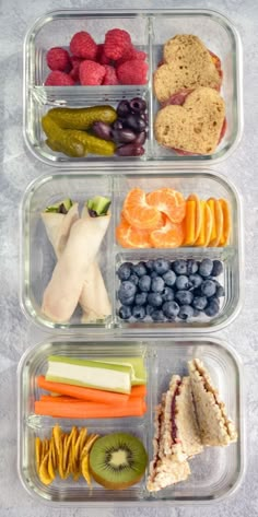 three plastic containers filled with different types of food and fruit on top of each other