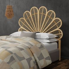 a bed with an intricate headboard made out of wicker