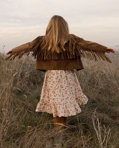 Super fun faux suede jacket with fringe all over. Color: Saddle Care: Dry clean only to maintain the shape of the jacket Face: 100% Flock, Base Fabric: 100% Polyester Brown Fringe Jacket, Suede Brown Jacket, Brown Jacket Outfit, All Over Color, Wooden Toy Shop, Sparkly Accessories, Brown Fringe, Western Shop