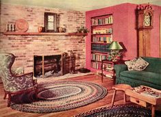 the living room is decorated in pink, green and blue colors with an old - fashioned fireplace