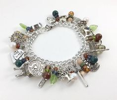 Outlander Charm Bracelet by Mistress Jennie on Etsy Doctor Who Charm Bracelet, Collectible Vintage Charm Costume Bracelet, Gothic Charm Bracelet, Victorian Vintage Charm Bracelet, Spiritual Nickel-free Dangle Charm Bracelet, Outlander Series, Outlander, Czech Glass, Pandora Charm Bracelet