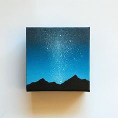 an acrylic painting of the night sky over mountains