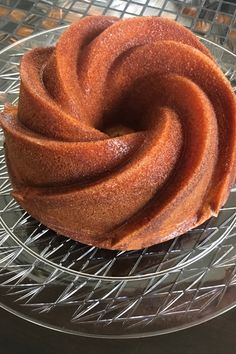 a cake sitting on top of a glass plate