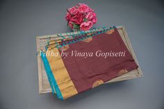 This Brown and Blue Kanchi Soft Silk Saree and Blouse is crafted from luxurious handloom silk for a traditional look and feel. Perfect for weddings and festivals, it's soft and comfortable to wear for all age groups. The beautiful combination of colors makes this saree a chic addition to any wardrobe. The accompanying saree blouse is tailored and embellished with handcrafted dori and tassels at the back. The attention to detail further enhances it and gives the blouse a great finish. Saree And Blouse, Brown And Blue, Soft Silk Sarees, Kids Pants, Blouse Dress, Saree Blouse, Kids' Dresses, Silk Saree, Silk Sarees