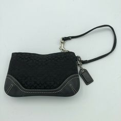 Coach wristlet. Condition is "Pre-owned". Shipped with USPS First Class. Coach Leather Wristlet With Zipper Closure, Black Leather Wristlet For Evening, Black Wristlet With Zipper For Everyday Use, Black Travel Wristlet With Wrist Strap, Black Wristlet With Zipper Closure For Evening, Everyday Black Wristlet With Zipper, Black Wristlet With Wrist Strap For Travel, Evening Black Wristlet With Zipper Closure, Black Evening Wristlet With Zipper Closure