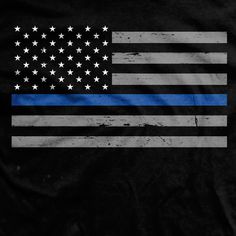 the thin blue line american flag on a black t - shirt with white stars in the center