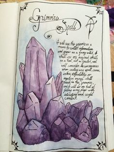 an open book with some rocks and writing on the page, in which there is a handwritten poem