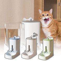 an orange and white cat standing next to three different types of gadgets