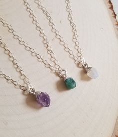 A natural dainty raw rough cut birthstone nugget floats on shimmering Sterling Silver chain in your choice of length. This petite necklace is sweet to wear on it's own and perfect to layer and mix with other favorites. These are 100% natural raw gemstone nuggets in their most organic state and will vary slightly in size and shape. Stones average size is about 8 mm to 10 mm. Details: * Raw natural gemstone birthstones * Genuine Sterling Silver Chain and Components (not plated) * Perfect little ev Dainty Raw Stone Jewelry For Healing, Dainty Everyday Jewelry With Raw Stone, May Birthstone Crystal Necklace For Healing, Dainty Sterling Silver Birthstone Necklace With Natural Stones, Dainty Charm Necklaces With Natural Stones For Healing, Sterling Silver Crystal Necklace With Raw Stone For Gifts, Healing Birthstone Charm Necklaces In Sterling Silver, Dainty Crystal Necklaces With Stones For Gift, Healing Sterling Silver Birthstone Charm Necklace