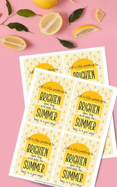 three brighten summer stickers sitting on top of a pink surface next to lemons