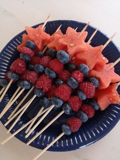 watermelon and blueberries on skewers with toothpicks